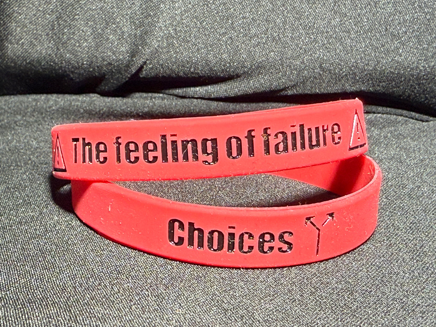 One Red and One White Choices wristband.