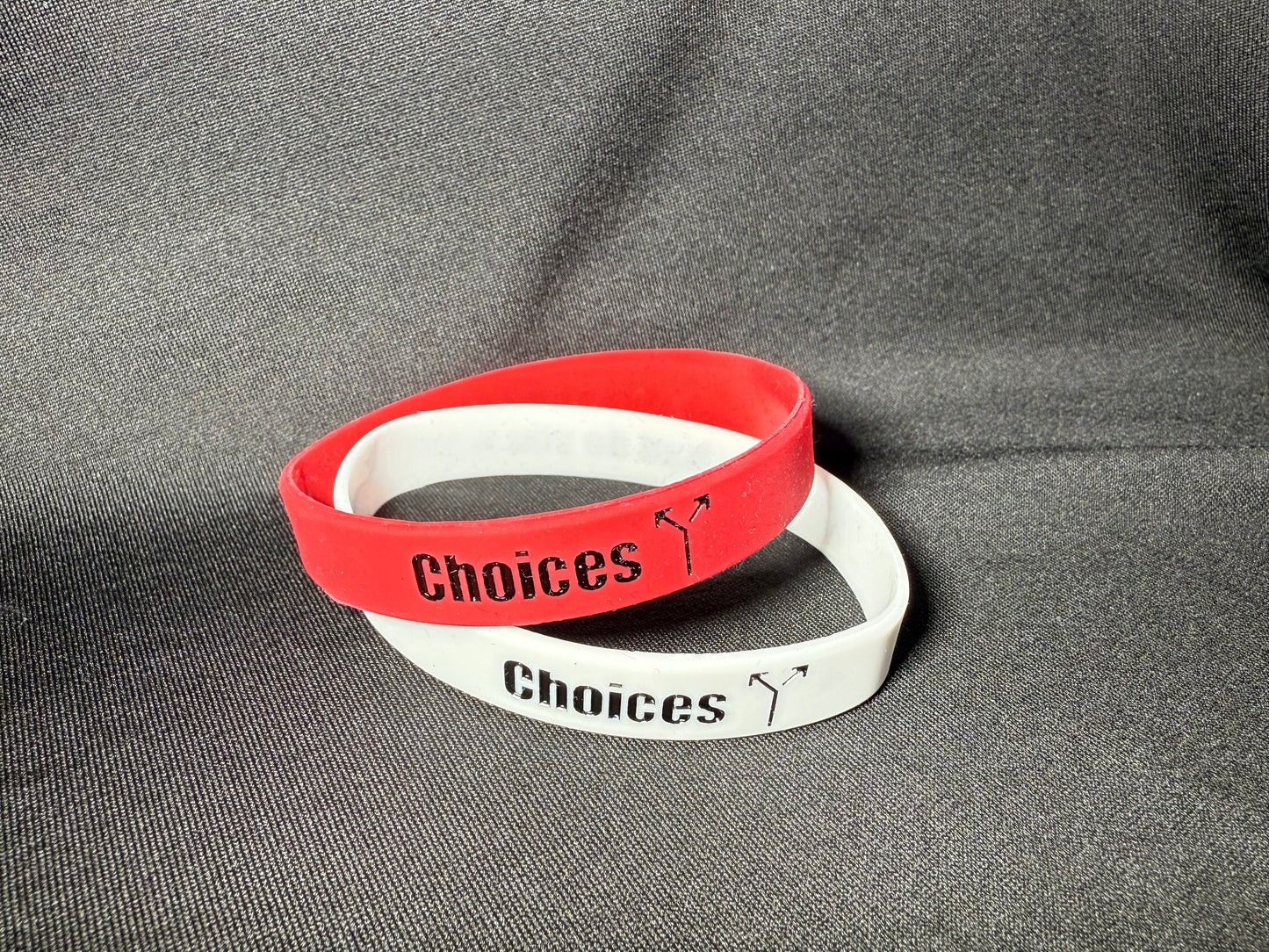 One Red and One White Choices wristband.